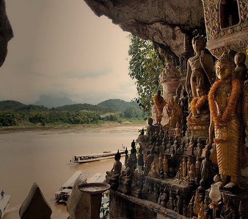 by ott1004 on Flickr.Pak Ou Caves are caves overlooking the Mekong River 25 km from Luang Prabang, Laos. They are a group of caves on the left side of the Mekong river, about two hours upstream from...