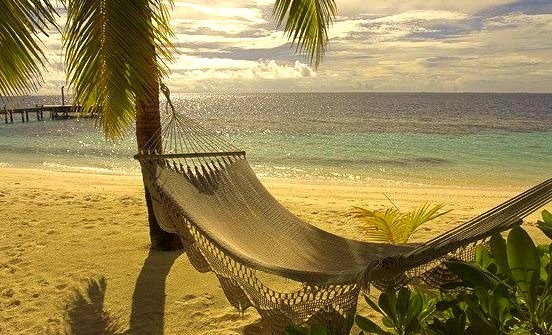 Empty hammock at Mirihi beach, Maldives