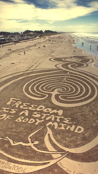 Sand art on Brighton Beach, Christchurch, New Zealand